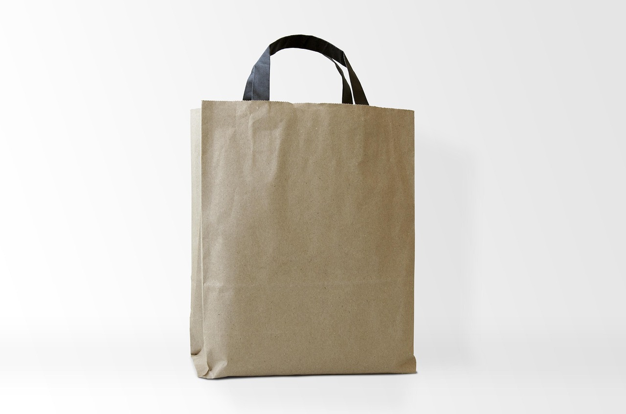 woman packing carry-on bag neatly